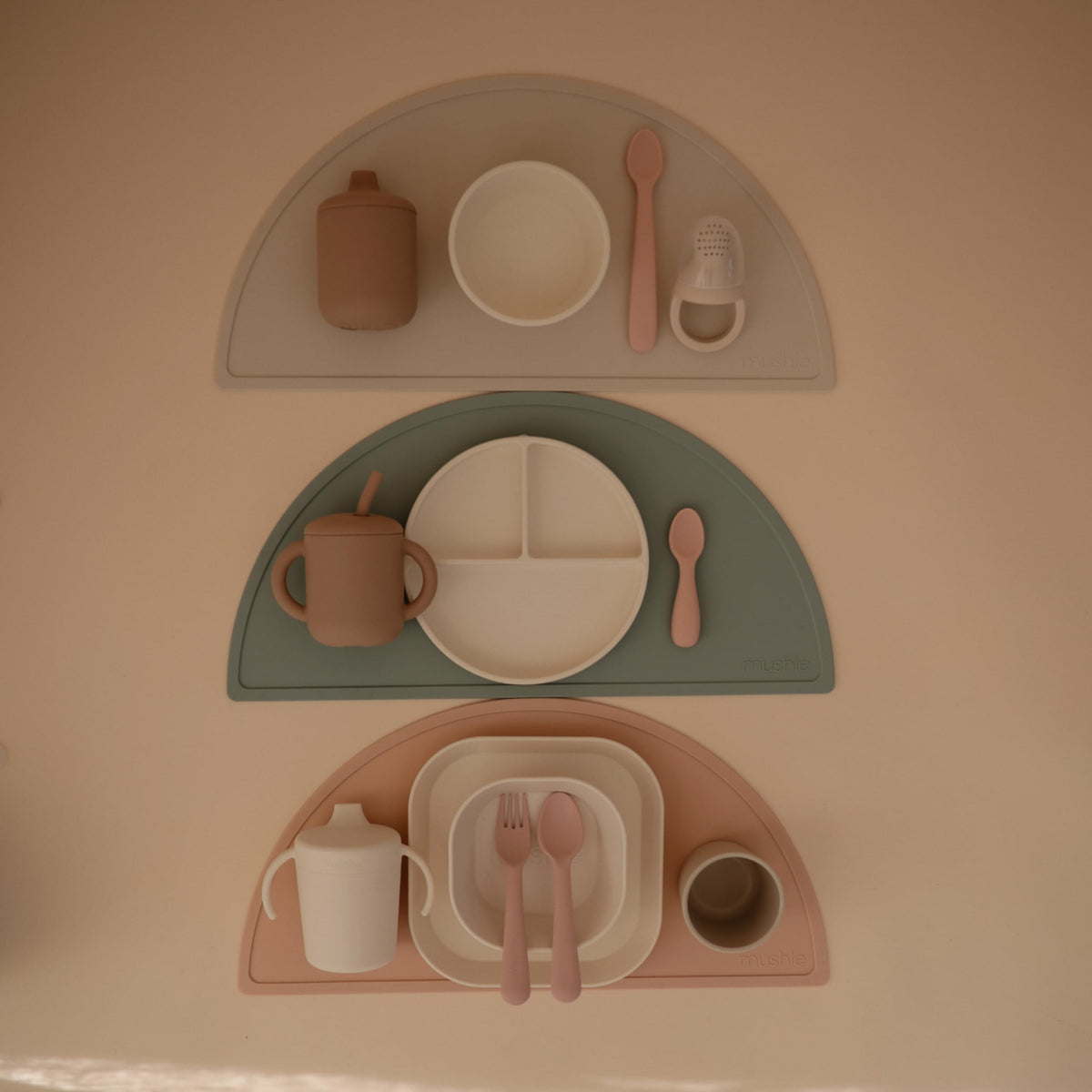 Mushie Ivory plates set on kitchen counter for easy mealtime setup