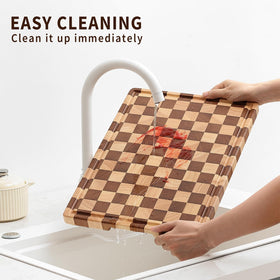 Musifan Acacia Wood Cutting Board being wiped clean with soap and water