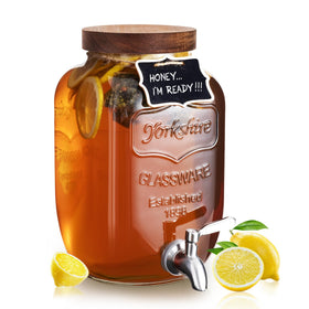 Mustry glass drink dispenser with spigot for easy party service.