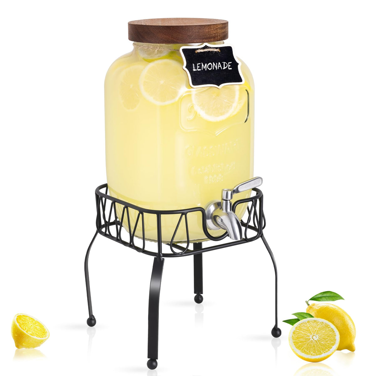 Mustry glass drink dispenser with stainless steel spigot and stand for easy serving.