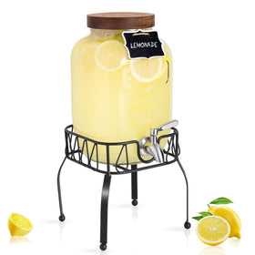 Mustry glass drink dispenser with stainless steel spigot and stand for easy serving.