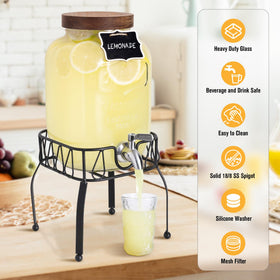 Mustry sun tea jar showcasing colorful brews and fresh scent.