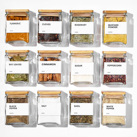 MUVEKA glass spice jars with bamboo lids show a space-saving square design for pantry organization