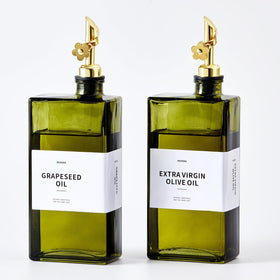 MUVEKA olive oil dispenser bottle with UV-protective glass and pour spout.
