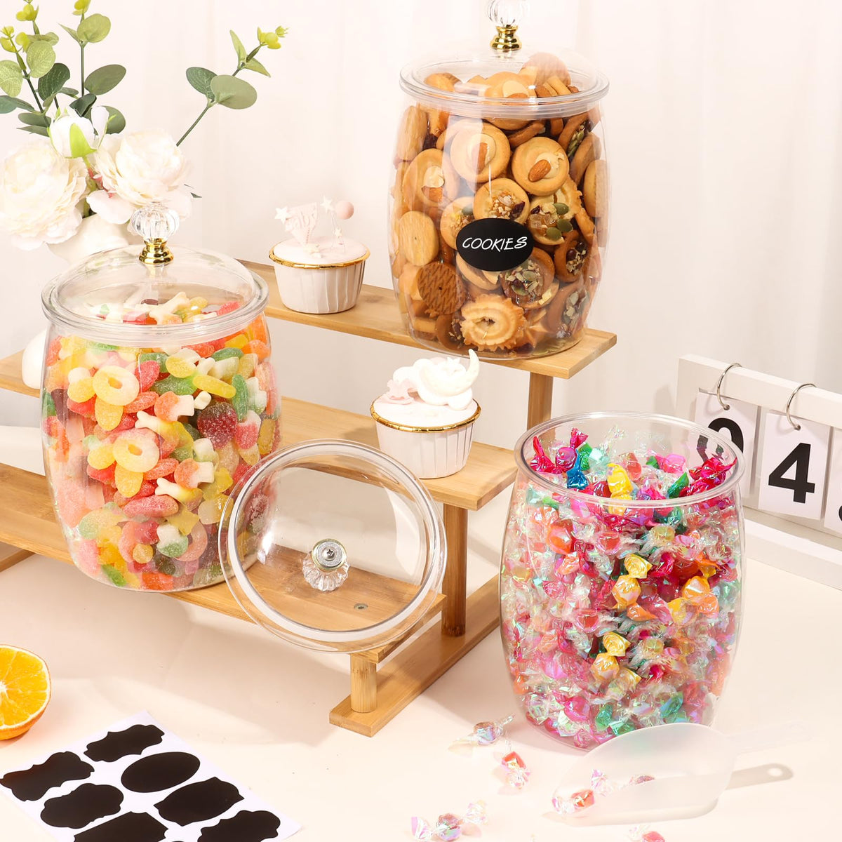 MWellewm apothecary jar with gold-rimmed lid adds elegant table decor.