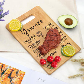 MY-ALVVAYS cutting board showcases unique wood grain for a decorative, functional kitchen accent.