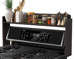 MyLifeUNIT shelf in use above stove keeps spices within reach.