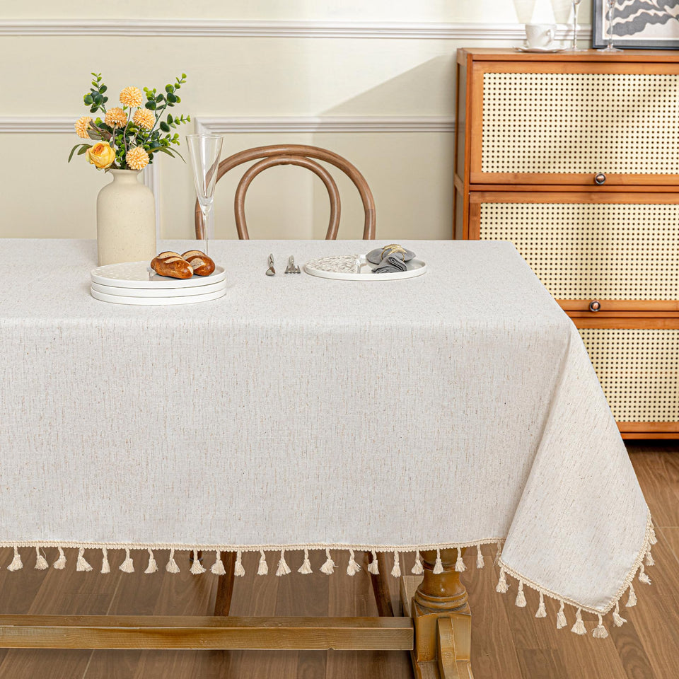 MYSKY HOME tablecloth with beige tassels for elegant dining on a 60x84 inch table.