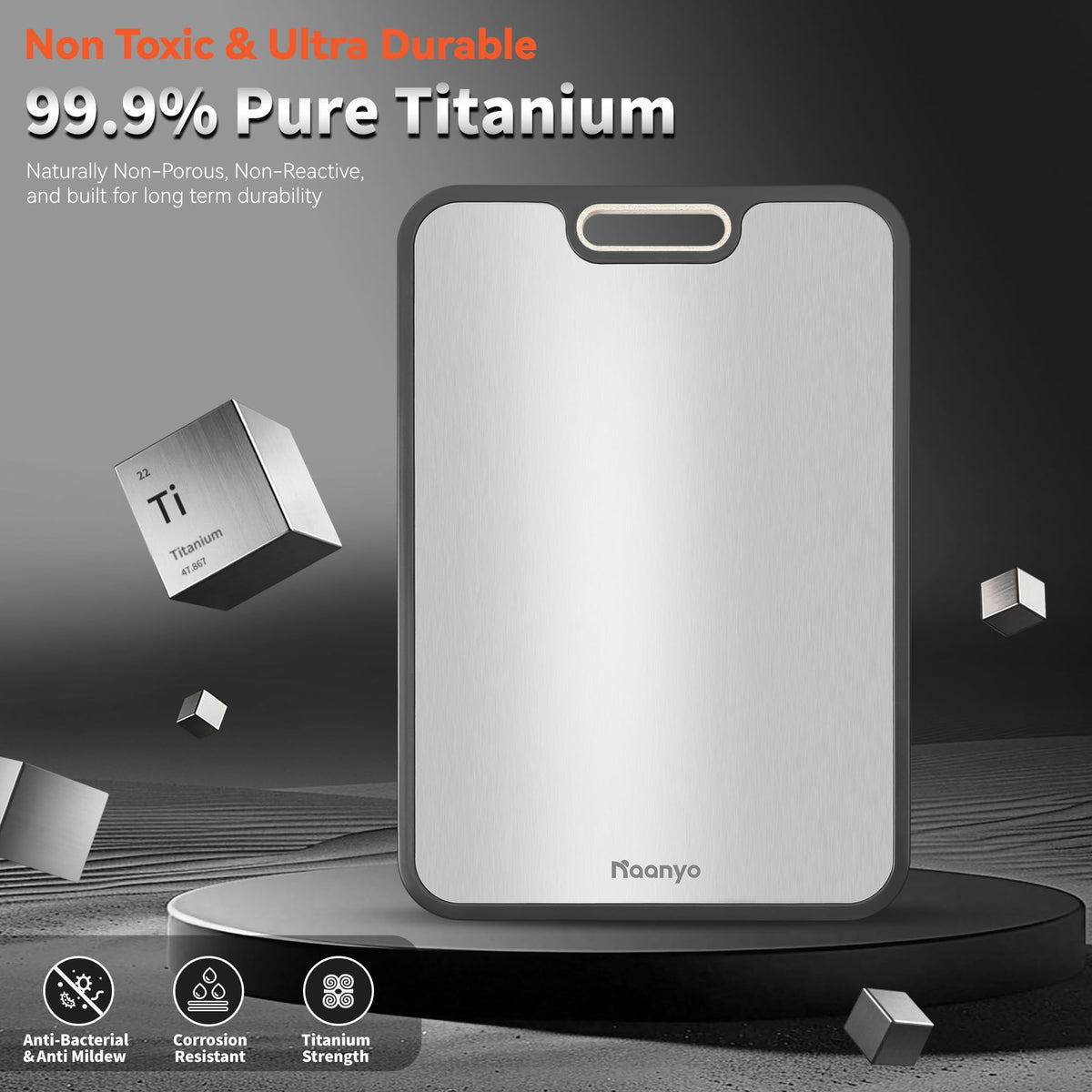 Naanyo titanium cutting board with juice groove captures liquids neatly during prep.