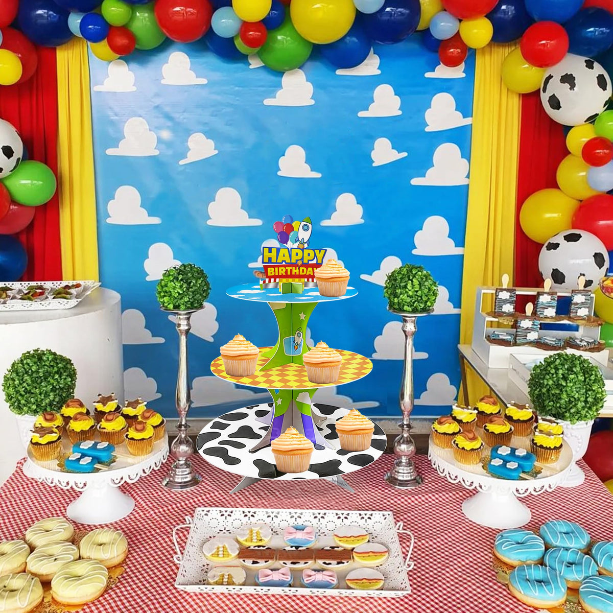 Nabenkalu cupcake tower used as birthday decoration with colorful treats.