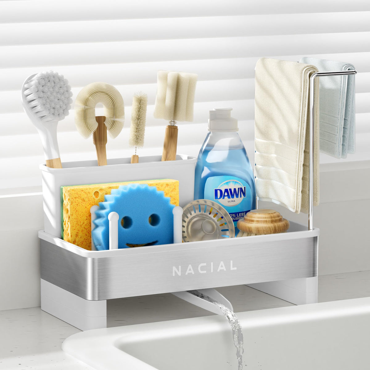 Nacial sponge holder on kitchen sink keeps sponges organized and dry.