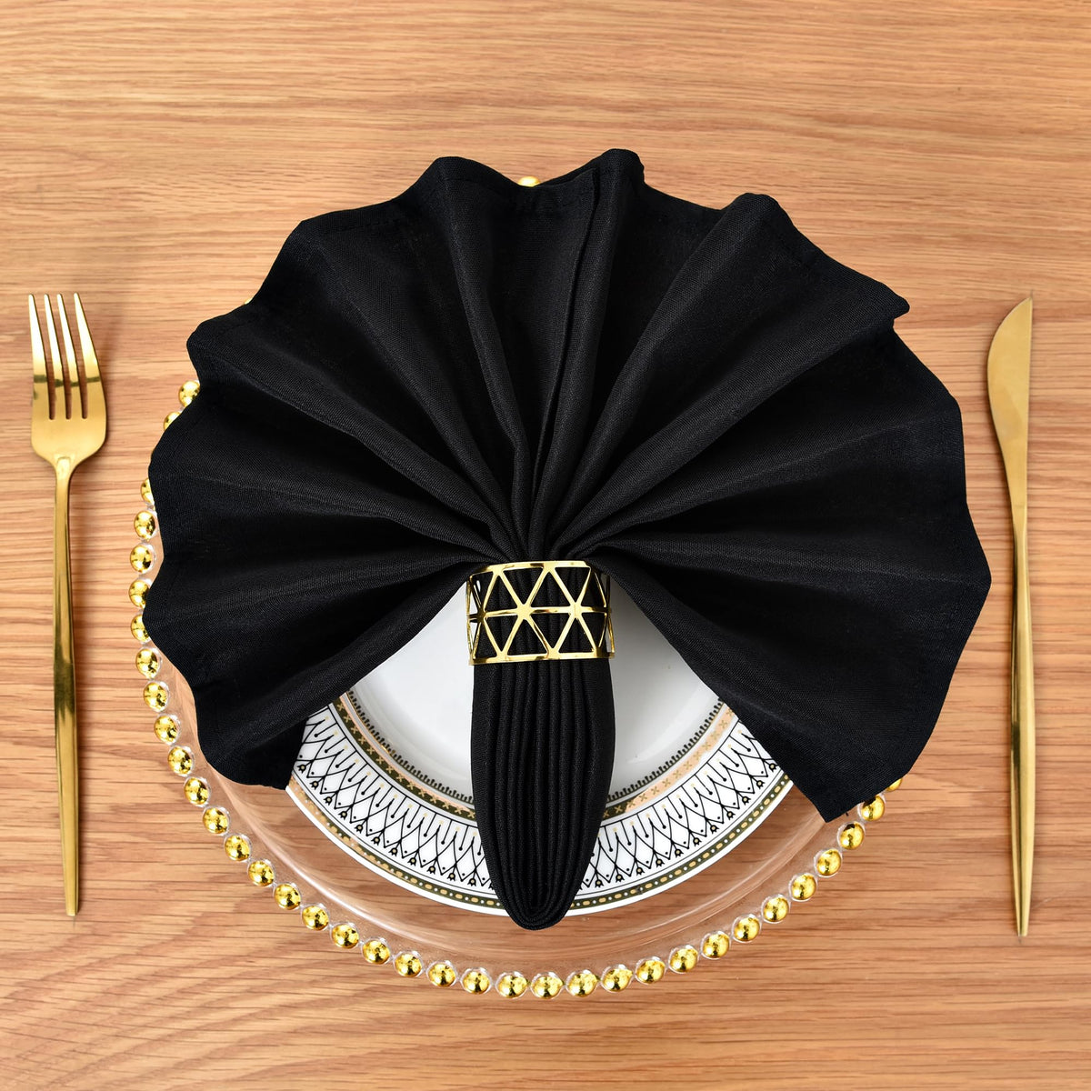 Nacuci napkins folded neatly for formal dinner.