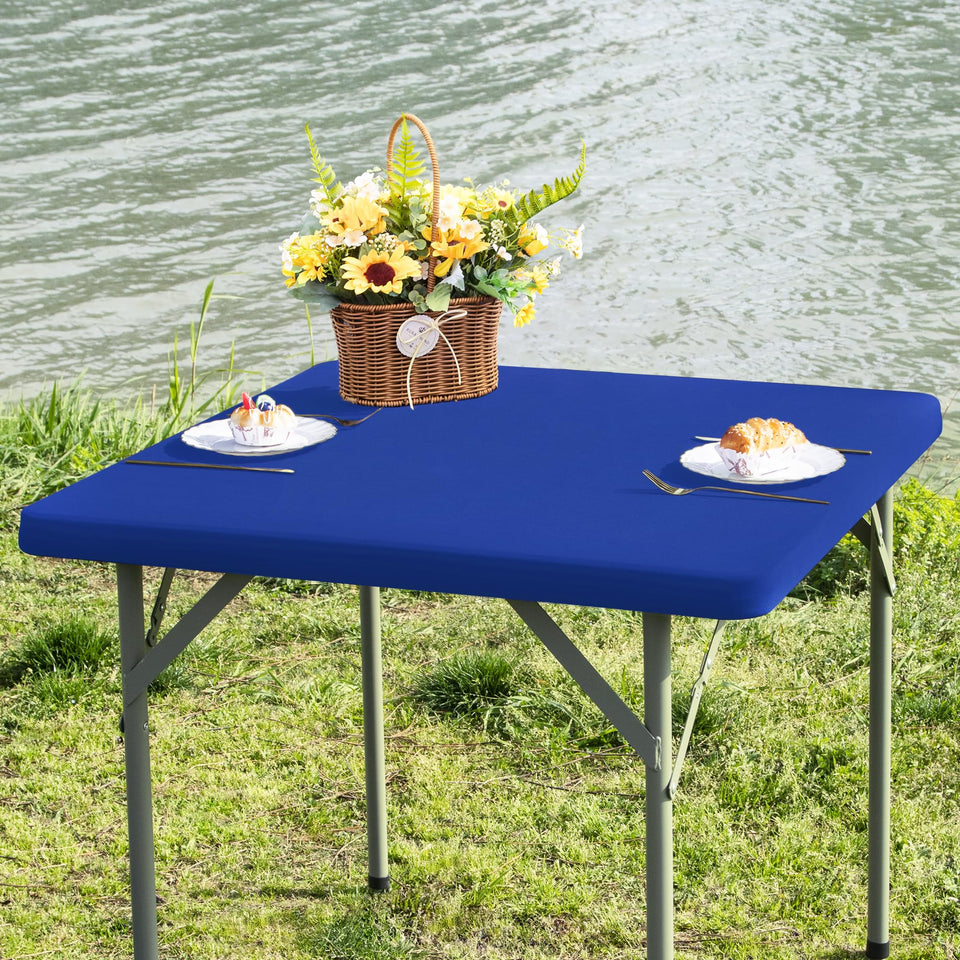 Nacuci square fitted blue table cover on 34x34 inch table, protecting the surface during meals