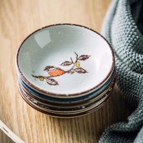 Nagpew 12-piece sauce-dish set adds colorful charm to gatherings.