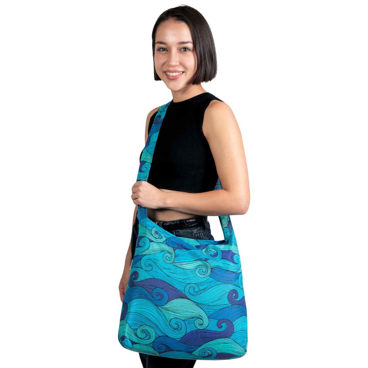 Nanobag Sling packed flat inside a pocket, ready for quick grocery runs.