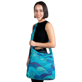 Nanobag Sling packed flat inside a pocket, ready for quick grocery runs.