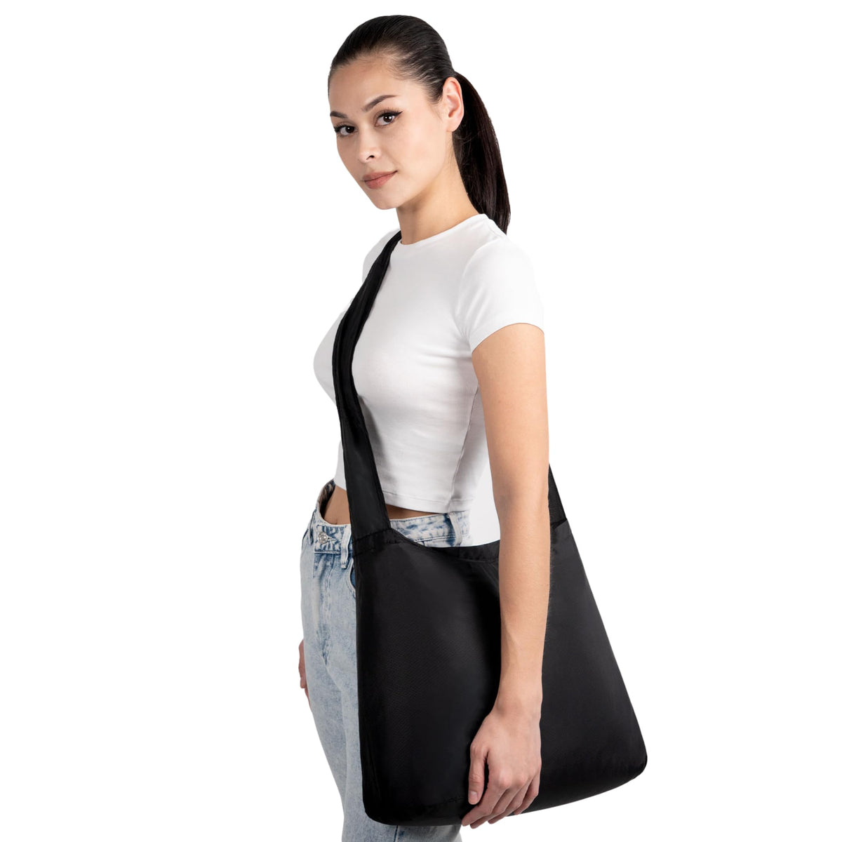 Nanobag Sling folded compactly shows effortless portability for grocery runs.
