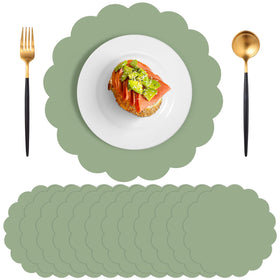 NatNarr sage green placemats 60-pack on table, ideal for quick party setup and mess protection