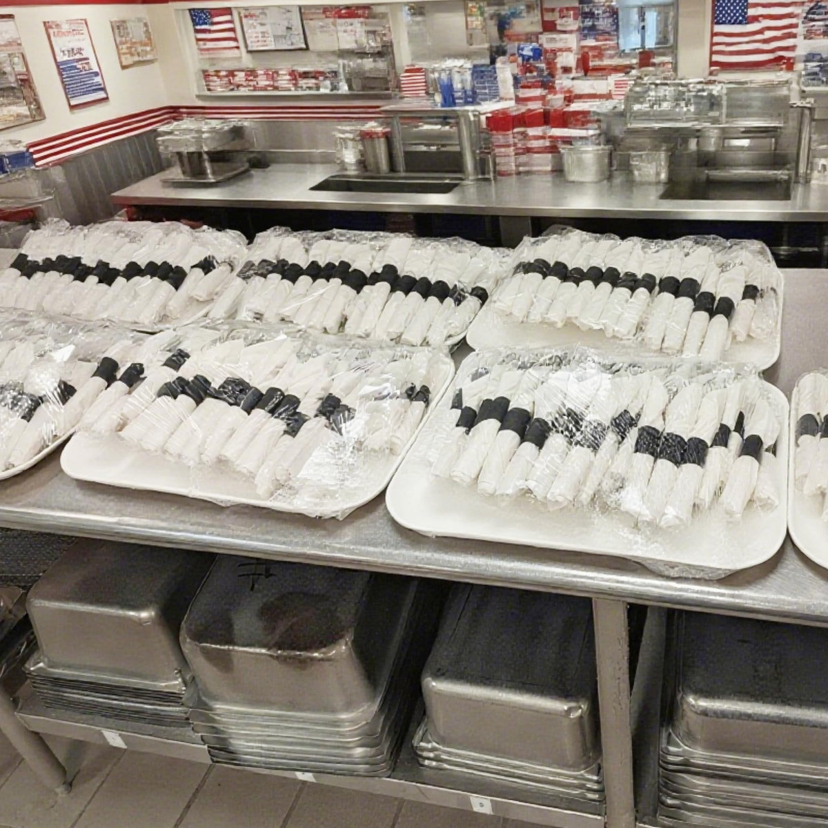 NATURALABEL napkin bands in use at a restaurant elevate table presentation and efficiency.