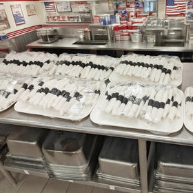 NATURALABEL napkin bands in use at a restaurant elevate table presentation and efficiency.