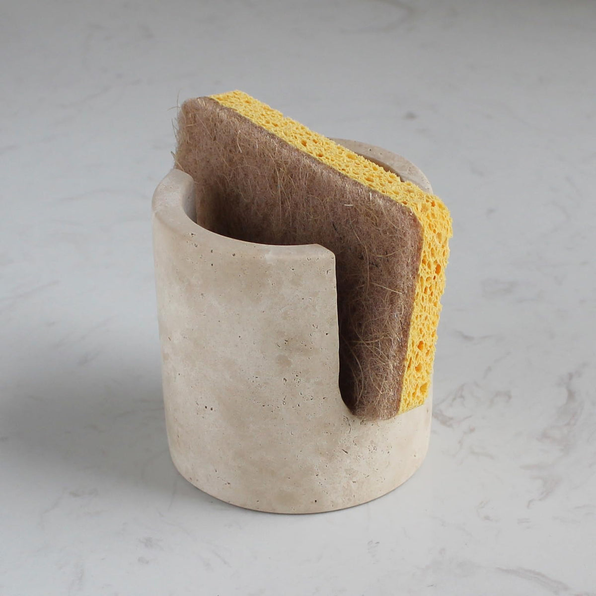 Natust minimalist design sponge holder enhances kitchen style.