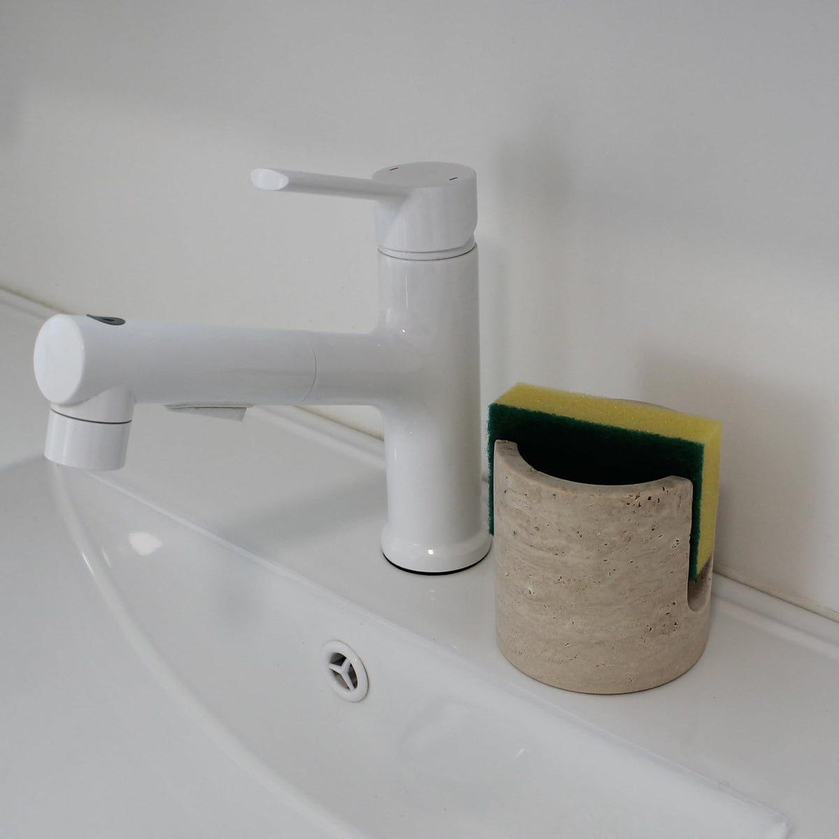 Natust drying rack sponge holder in beige travertine promotes fast drying.