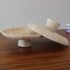 Nawgnail travertine fruit bowl texture closeup with matte finish.