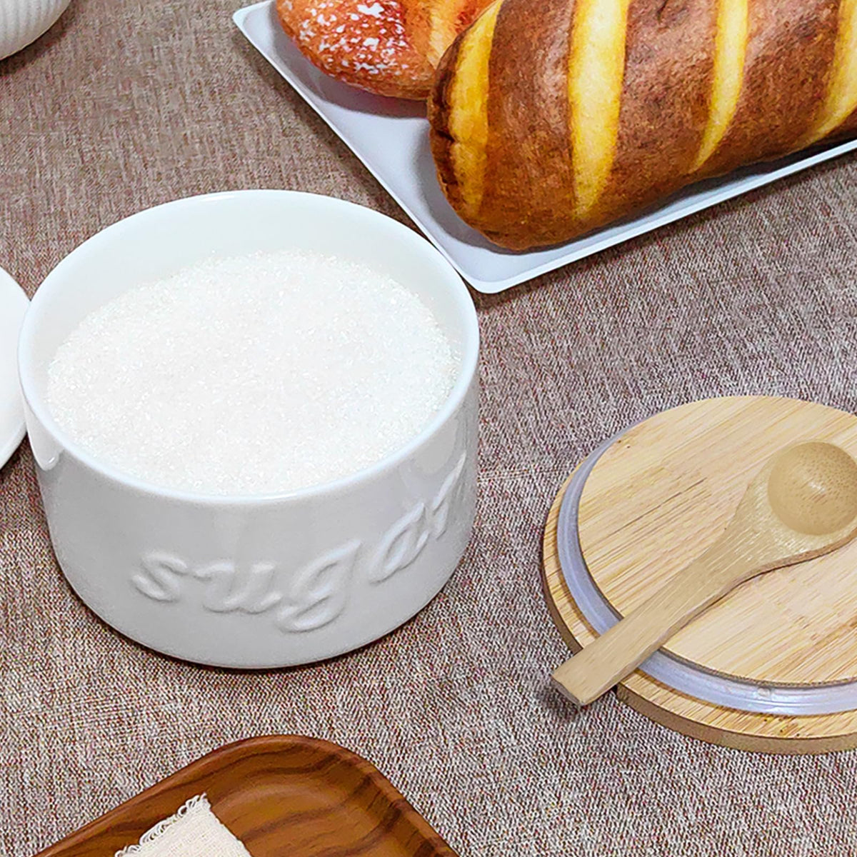 NAXIHOPT stackable design sugar jar saves counter space.
