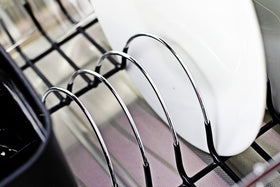 Neat-O Deluxe chrome dish drainer dish slot layout holds eight plus plates safely.