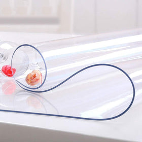 NECAUX table cover in clear 24x48 protects wood surfaces while preserving natural grain.