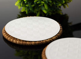 Necessia Cortado Glasses pair with included coasters for refined service.