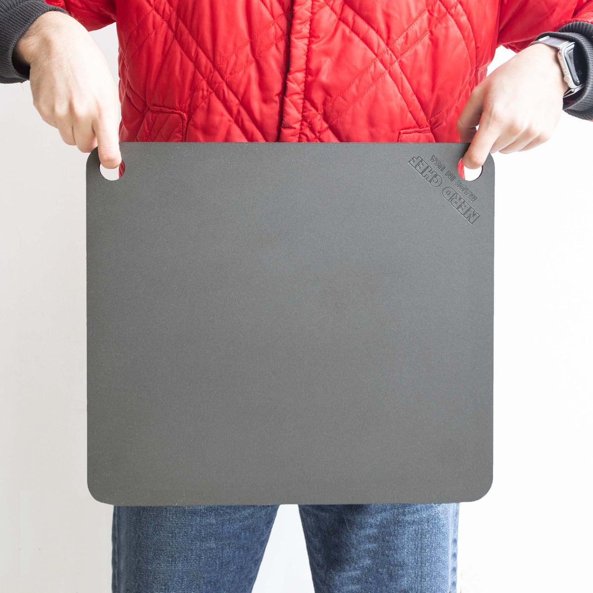 Close-up of NerdChef Steel Stone showcasing heat transfer detail for faster cooking.