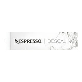 Nespresso descaling kit includes cleaning cloth for easy maintenance and wipe-down.