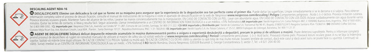 Instruction booklet included with Nespresso descaling solution for easy use.