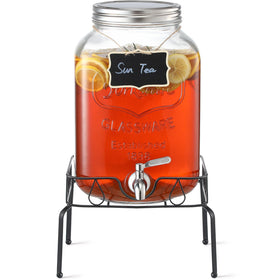 NETANY 2-gallon glass beverage dispenser with stand and lid displayed as a stylish party centerpiece