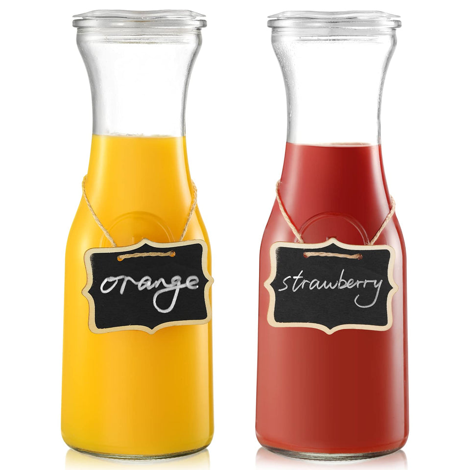 NETANY glass carafes with lids, 1 L, perfect for mimosa bars and cold beverages.