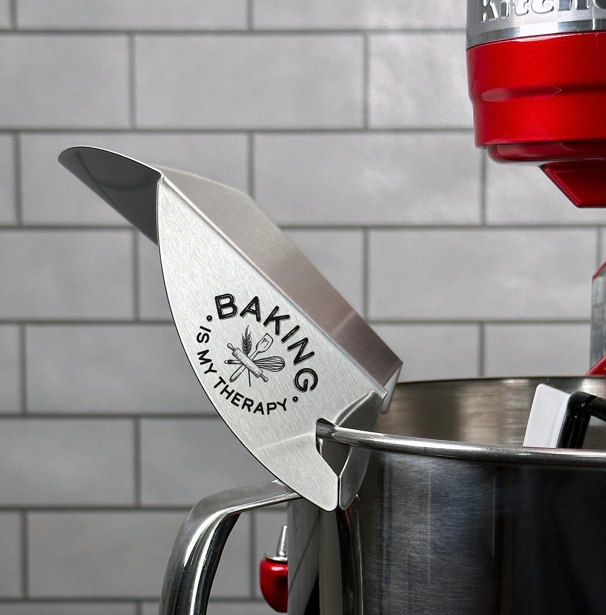 New Metro Design Pouring Chute shows laser-etched motto for kitchen motivation.