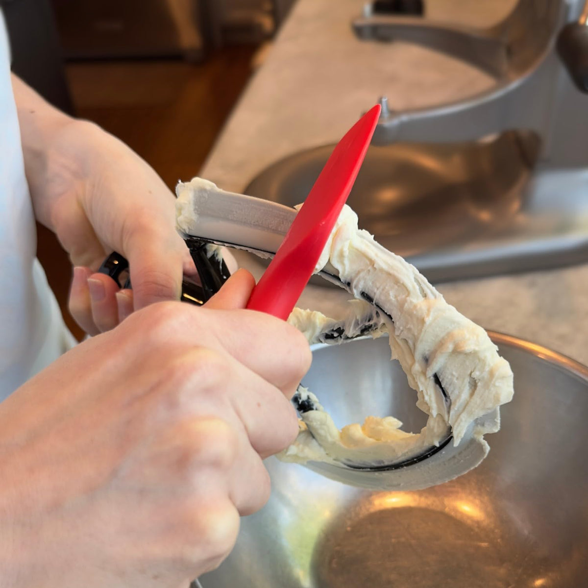 New Metro Design Spatula ONE beater-cleaning aid helps reach tight corners.