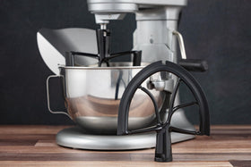 Close-up of XL-MAX blade showing dimple scraping action for even batter.