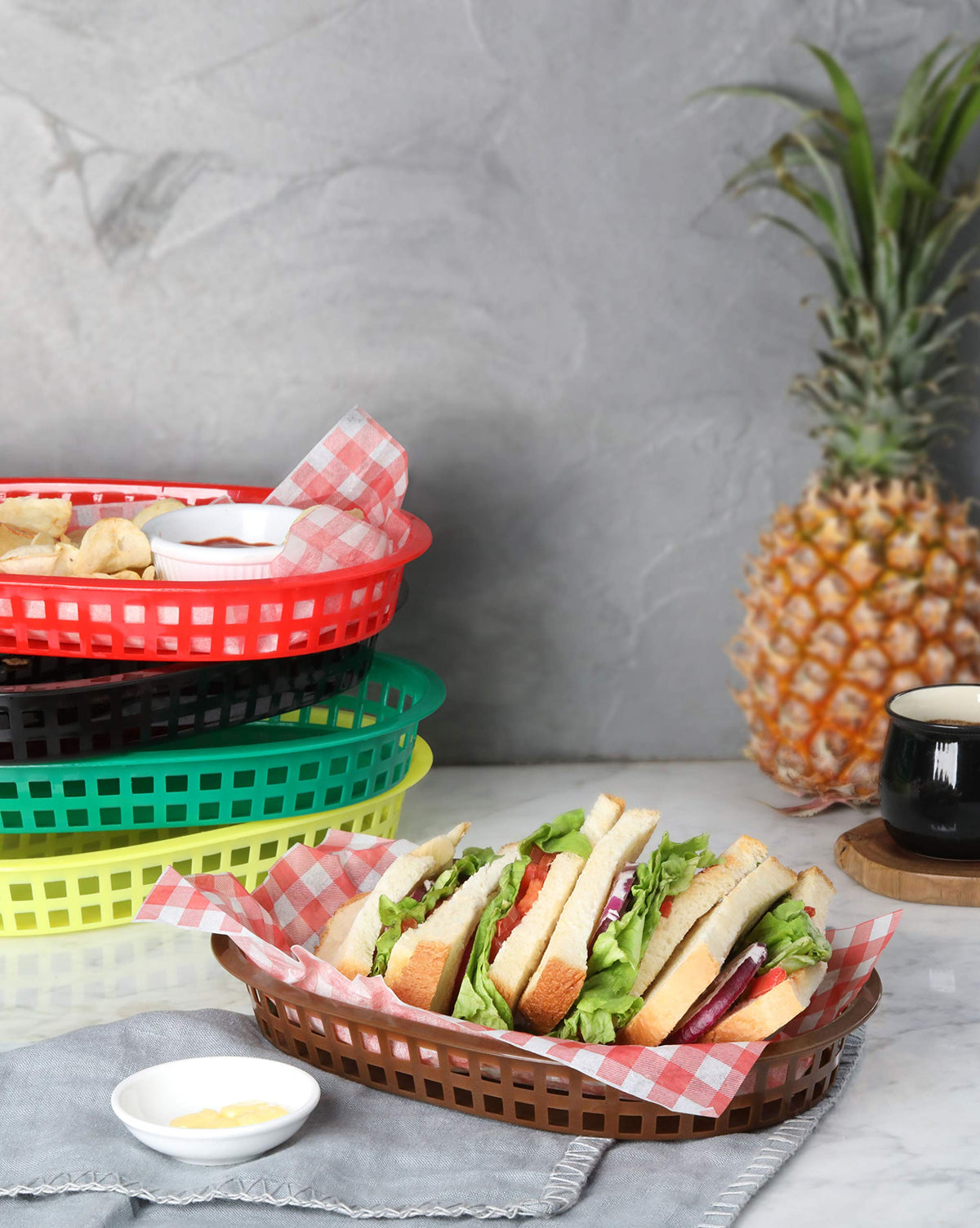 New Star red fast food basket pairs with deli paper for clean service.