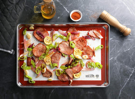 New Star Foodservice mat with corner cutouts facilitates fast, clean pan removal.