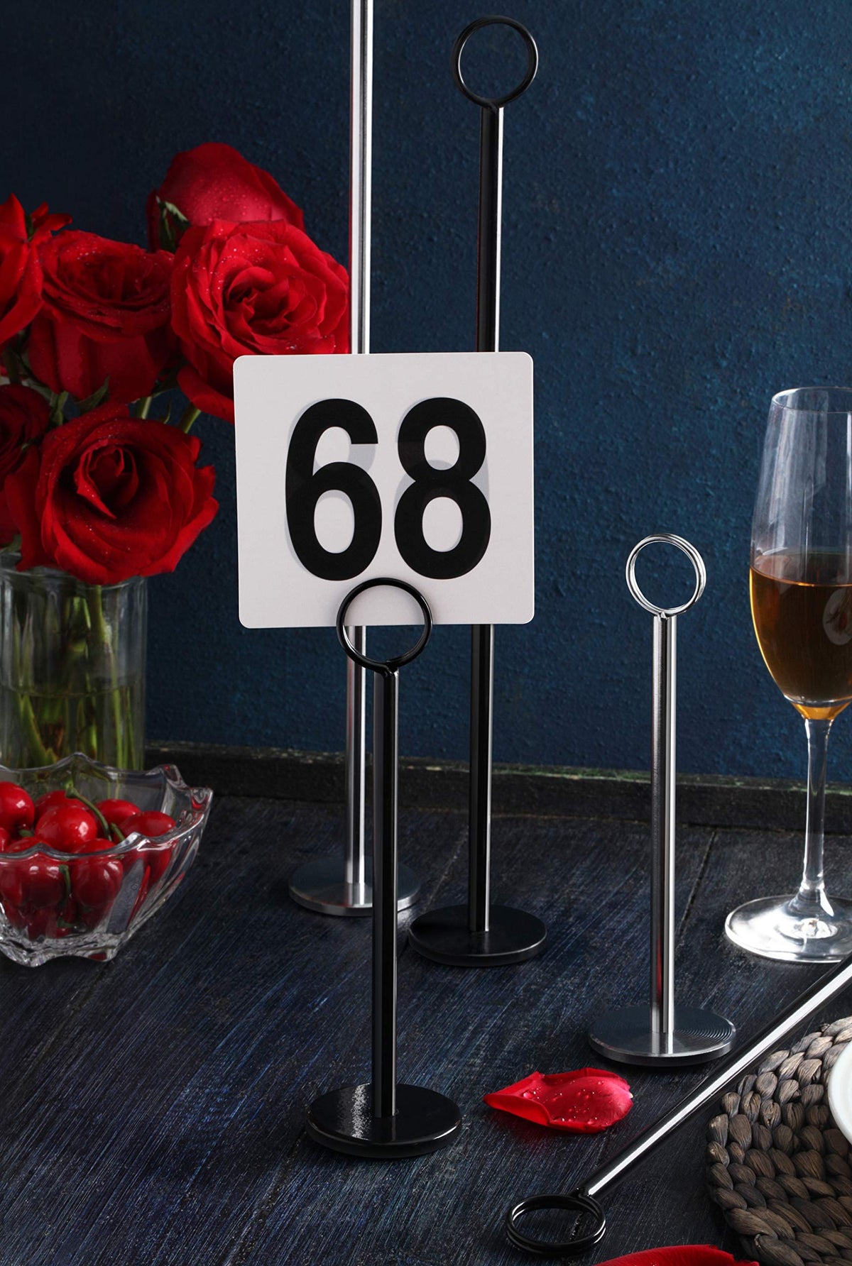 Wedding reception setup with ring-clip stands for easy guest flow and labeling.