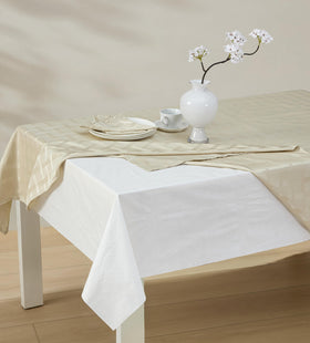 Newbridge Quilted table pad protector back with flannel demonstrates slip-free backing