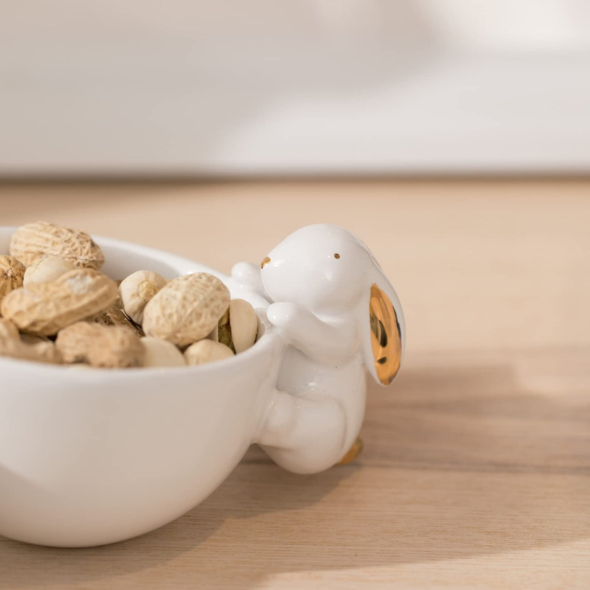 Newman House Studio snacks and nuts served in three bowls.