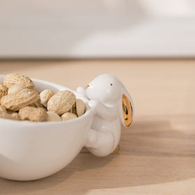 Newman House Studio snacks and nuts served in three bowls.