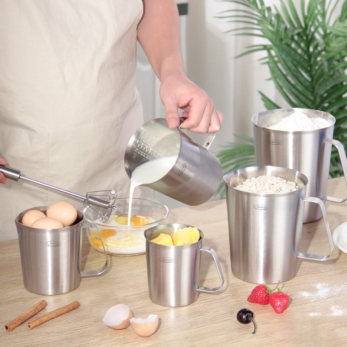 Newness measuring cup wall-hanging storage keeps counter tidy.