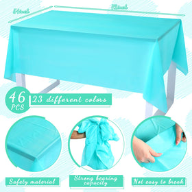 Newwiee rainbow tablecloths in 23 colors brightening an outdoor picnic setup