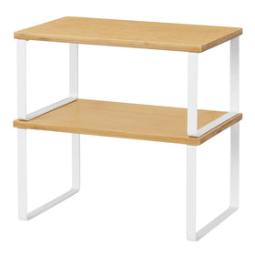 NEX stackable low shelf in wood and metal for compact cabinet storage.