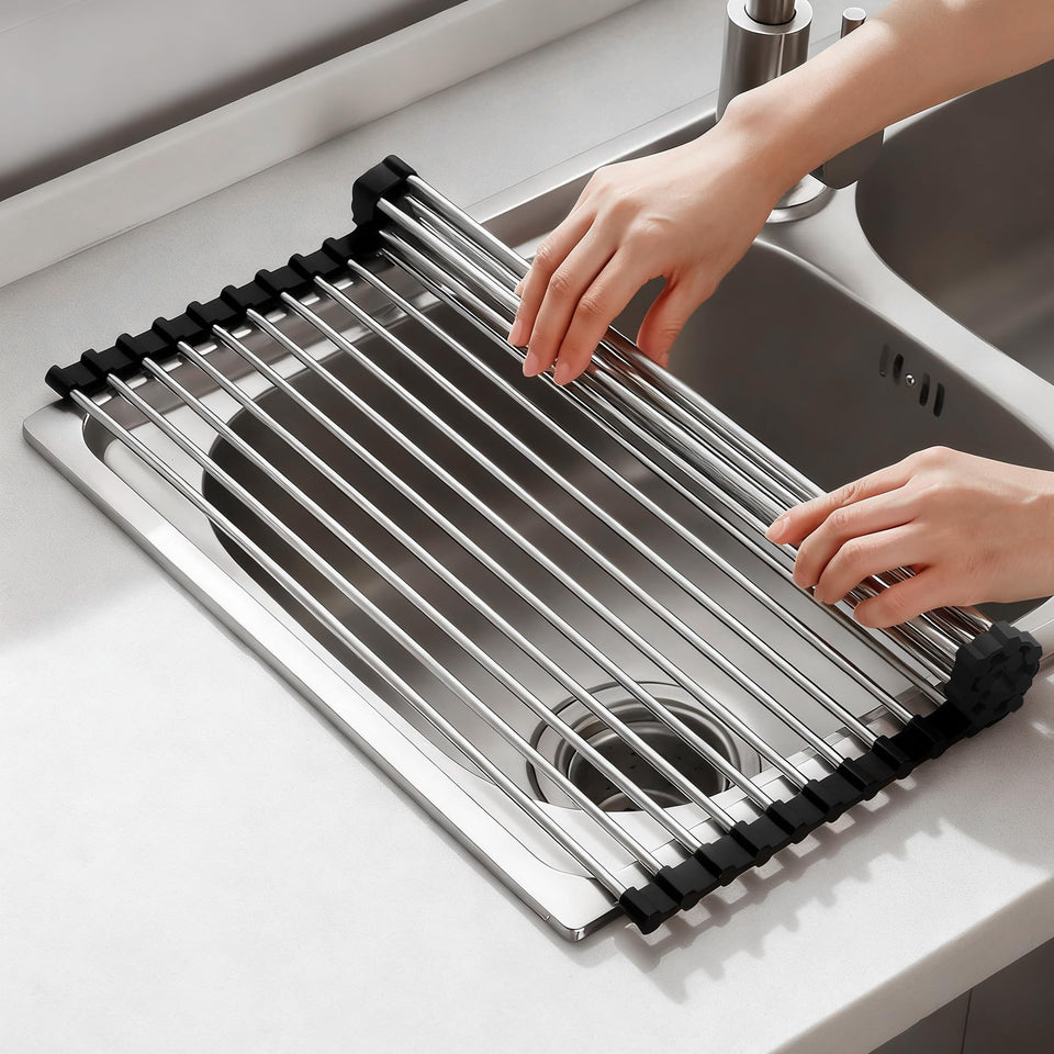 NEZUIBAN dish drying rack roll-up over sink in black dries dishes and saves counter space.