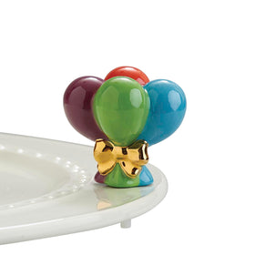 Nora Fleming base with mini selection as a versatile centerpiece for gatherings